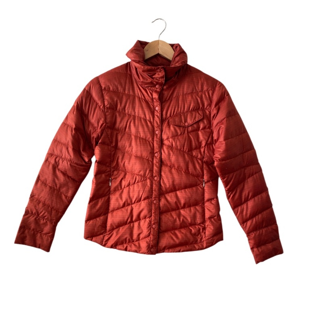 Nau women’s 100% goos down size XS runs larger pristine condition like new